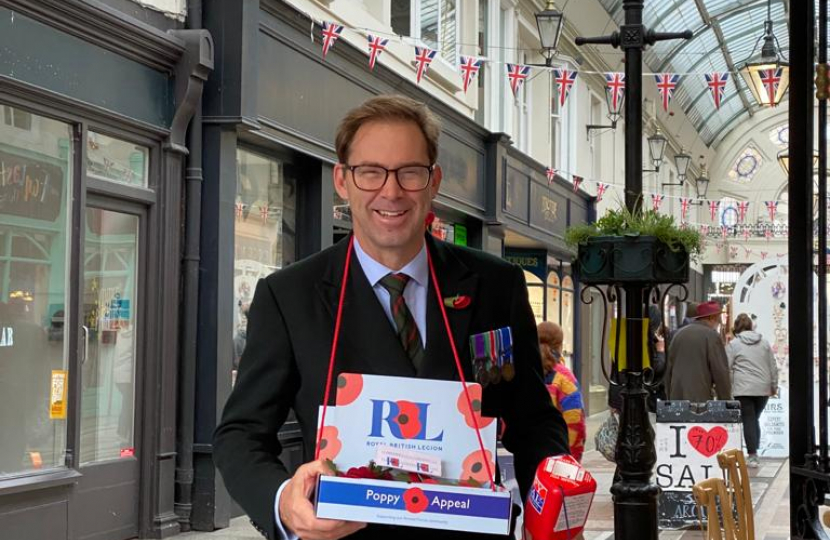Tobias Ellwood MP selling poppies in Bournemouth's Arcade